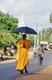 Sri Lanka: Monk with umbrella, Anuradhapura
