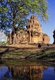 Prasat Sikhoraphum is a Khmer Hindu temple built in the 12th century by King Suryavarman II (r. 1113 - 1150).<br/><br/>

Prasat Sikhoraphum dates from the early 12th century and has been beautifully restored. It consists of five brick prangs on a square laterite platform surrounded by lily-filled ponds. The lintel and pillars of the central prang are beautifully carved with heavenly dancing girls, or apsara, and other scenes from Hindu mythology. 